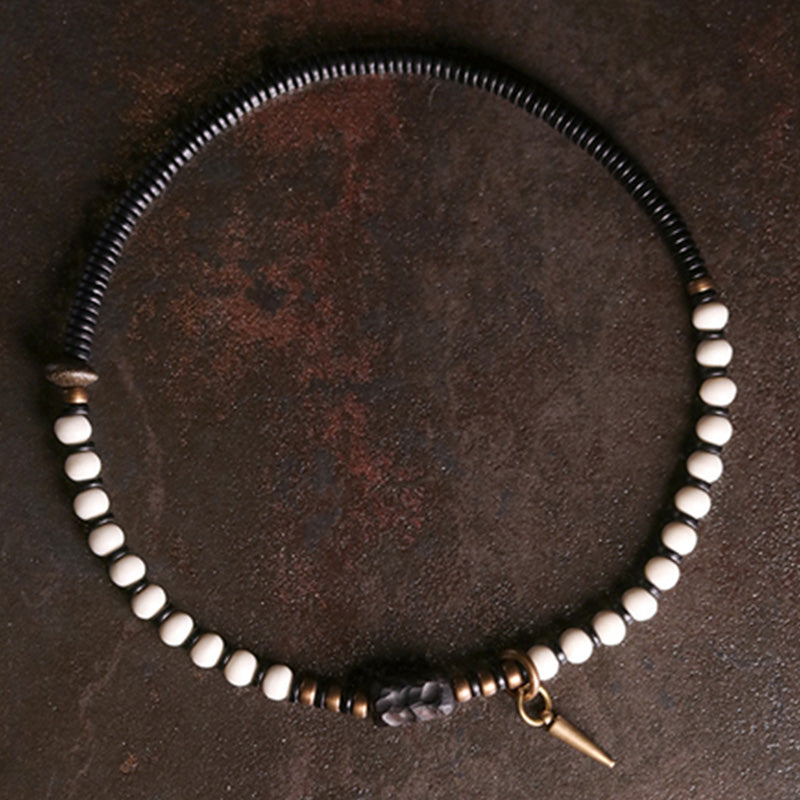 Bracelet couple force en bois d'ébène et cuivre, perles d'os et Buddha Stones
