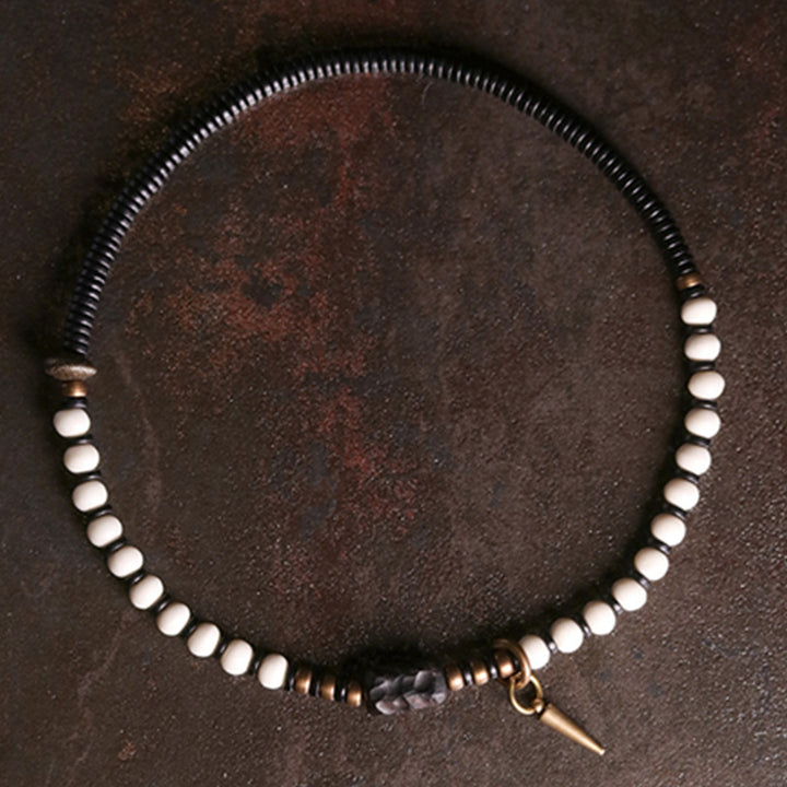 Bracelet couple force en bois d'ébène et cuivre, perles d'os et Buddha Stones