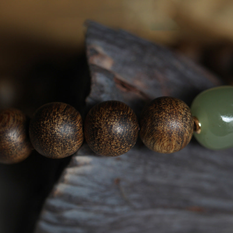 Bracelet de force de paix en jade Hetian et bois d'agar Huang Qinan du Vietnam