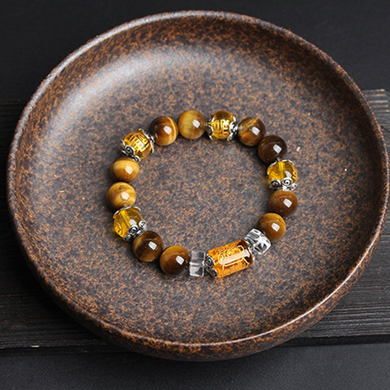 Bracelet de prospérité en perles d'œil de tigre et Buddha Stones