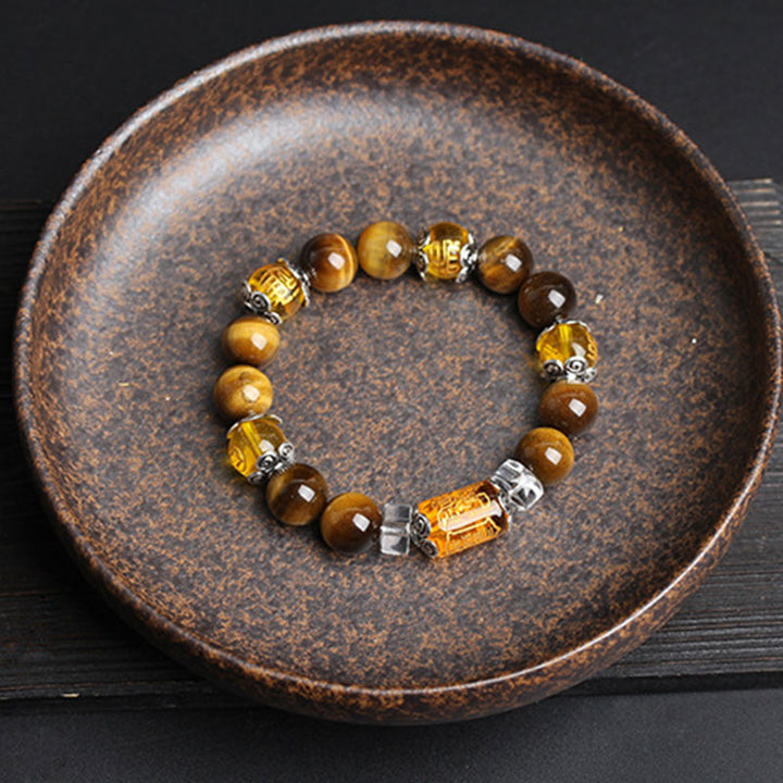 Bracelet de prospérité en perles d'œil de tigre et Buddha Stones