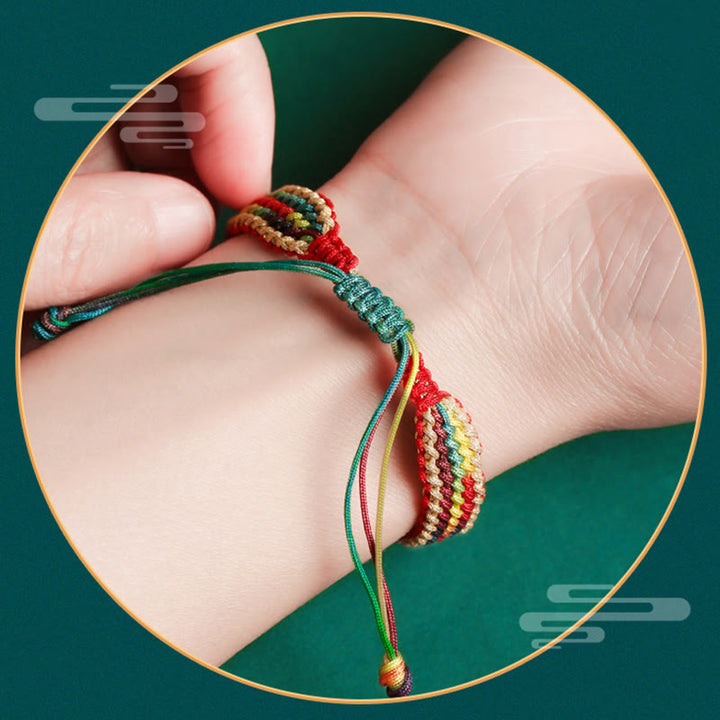 Bracelet tressé de protection multicolore arc-en-ciel fait main en Buddha Stones tibétaines