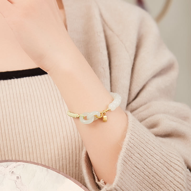 Bracelet tressé en perles de jade Hetian naturelles de Buddha Stones avec boucle de paix double et caractère Fu