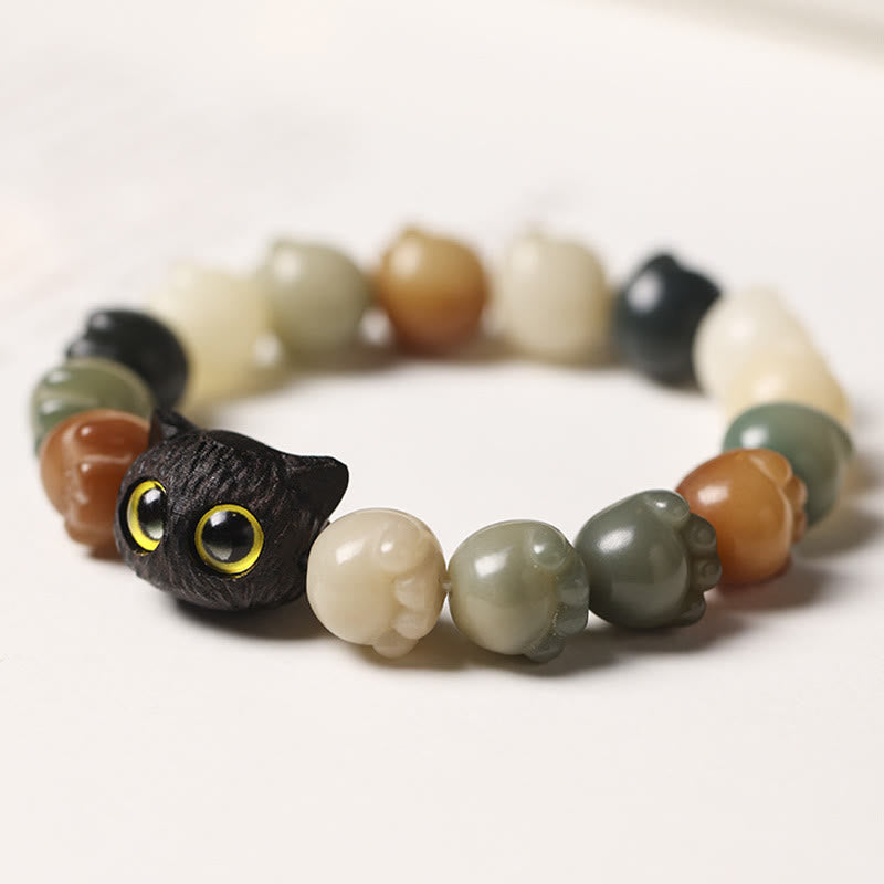 Bracelet de sagesse porte-bonheur en bois d'ébène avec de belles pattes et des graines de Bodhi naturelles de Buddha Stones - image 2