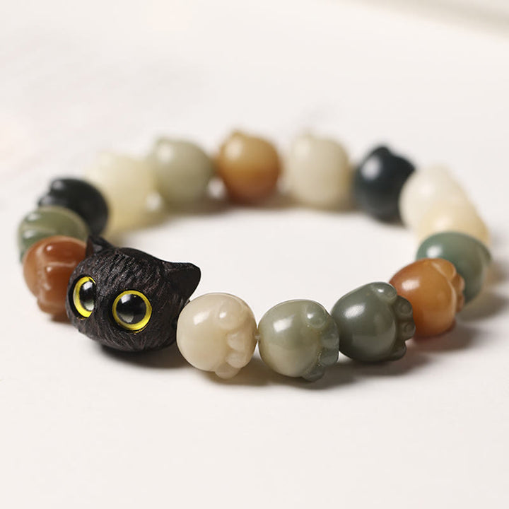 Bracelet de sagesse porte-bonheur en bois d'ébène avec de belles pattes et des graines de Bodhi naturelles de Buddha Stones - image 2
