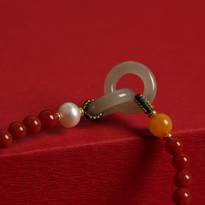 Bracelet de confiance à double boucle de paix en agate rouge naturelle et jade Hetian de Buddha Stones