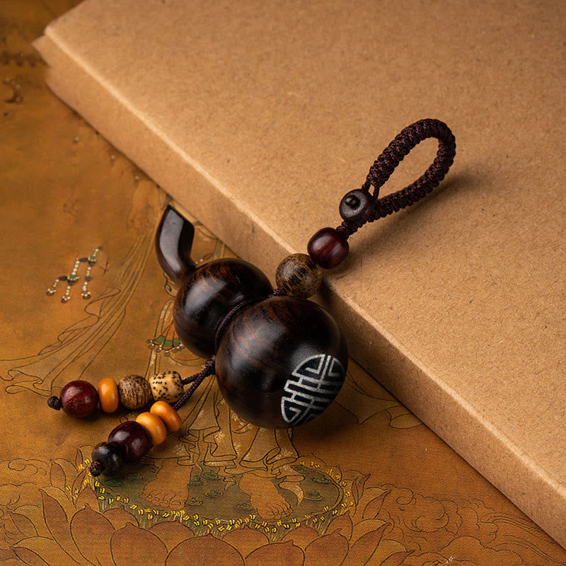 Porte-clés porte-bonheur en ébène tibétain à petites feuilles de gourde en bois de santal rouge