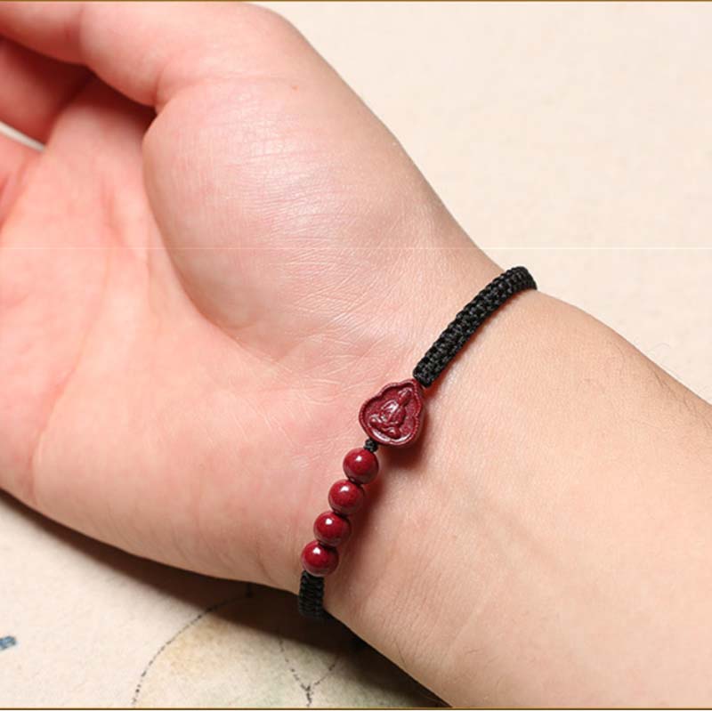 Bracelet en cordon de bénédiction en cinabre Bouddha rieur Avalokitesvara de Buddha Stones