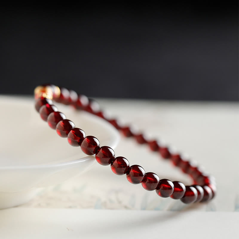 Bracelet de protection en grenat naturel avec poisson koï en or 999 de Buddha Stones - image 3