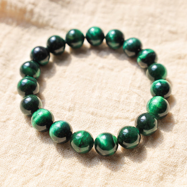 Bracelet énergétique de guérison et de croissance en œil de tigre Buddha Stones