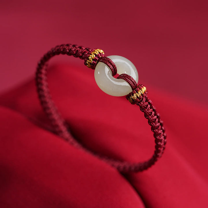 Bracelet tressé en jade avec boucle de paix et Buddha Stones