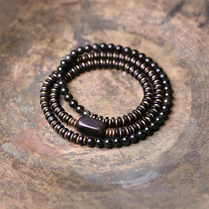 Bracelet triple tour de guérison en cuivre et bois d'ébène avec Buddha Stones arc-en-ciel et obsidienne