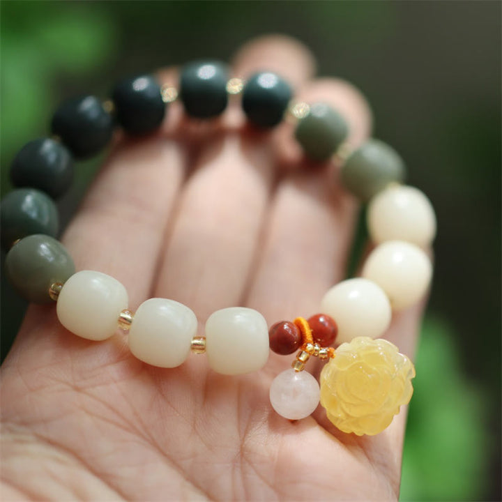 Bracelet de paix en ambre et graines de Bodhi avec Buddha Stones dégradées