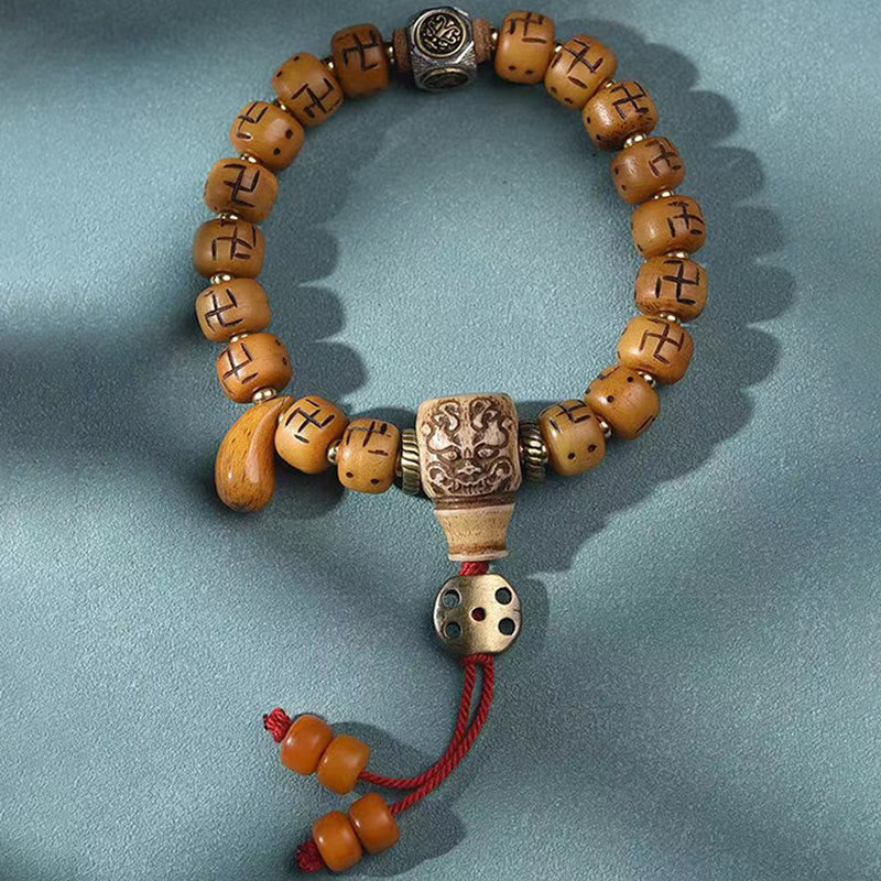 Buddha Stones en os de chameau tibétain naturel, croix gammée Dzi, perle Shankha, breloque de bouddha Kirtimukha, Bracelet à pompon de Protection porte-bonheur