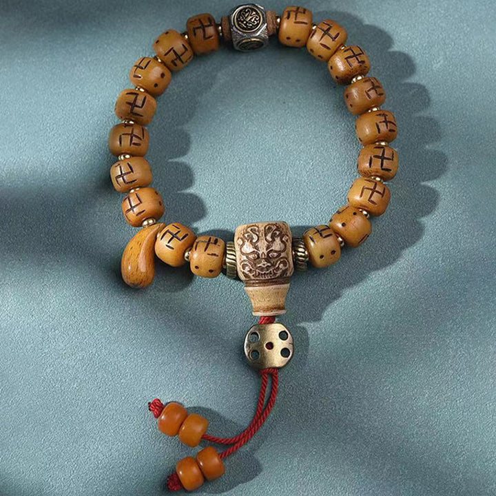 Buddha Stones en os de chameau tibétain naturel, croix gammée Dzi, perle Shankha, breloque de bouddha Kirtimukha, Bracelet à pompon de Protection porte-bonheur