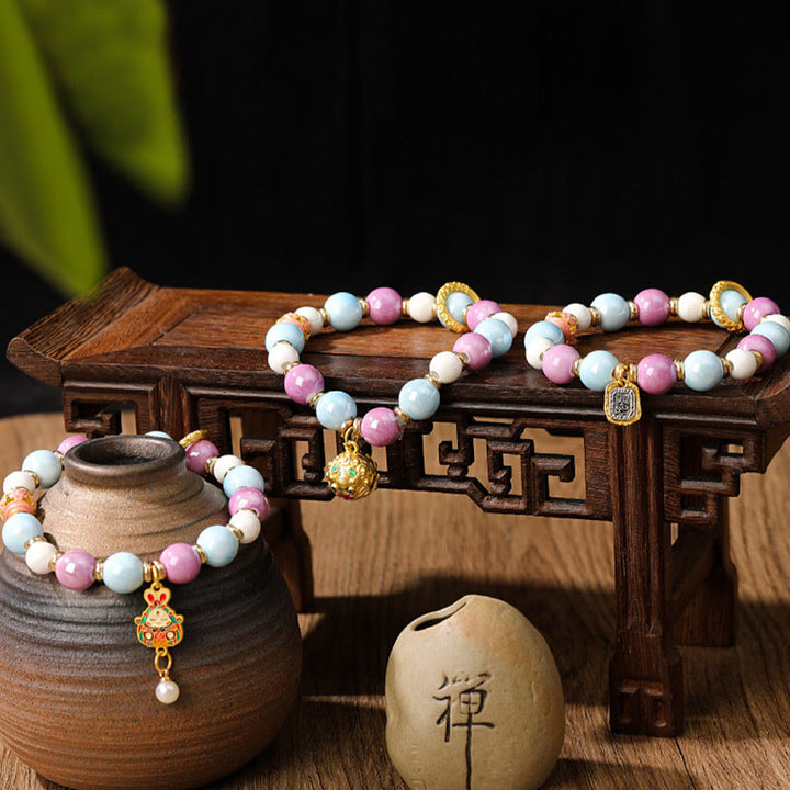 Buddha Stones Tibétain Zakiram Déesse de la Richesse Lapin Tête de Lion Charme Liuli Verre Encens Cendres Perle de Porcelaine Bracelet de Protection