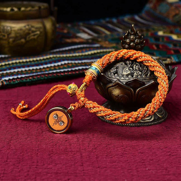 Bracelet tibétain en corde tressée avec breloque porte-bonheur Thangka en Buddha Stones