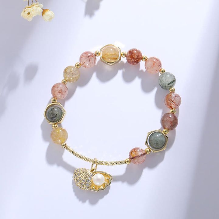 Bracelet de perles de protection en coquillage de quartz rutile coloré naturel de Buddha Stones