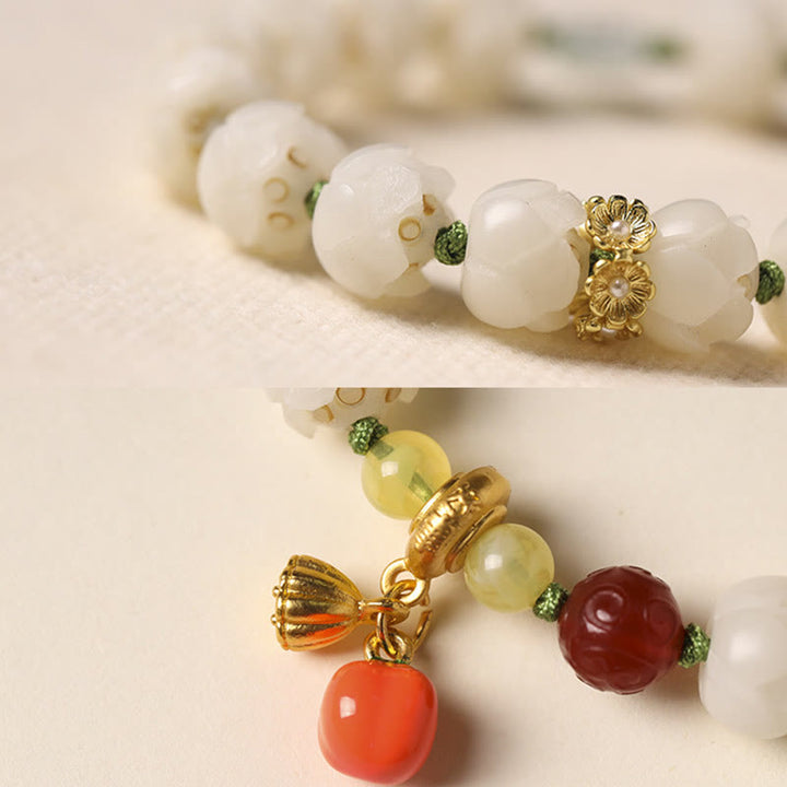 Bracelet d'harmonie et de paix en perles de citrouille et de lotus en Buddha Stones naturelles