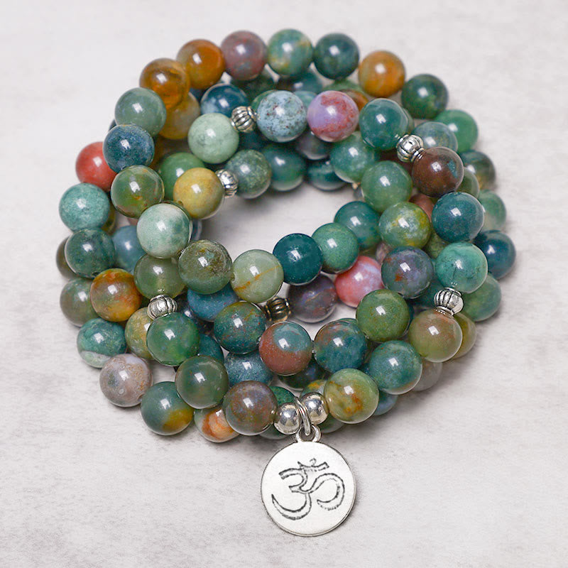 Bracelet Mala 108 Buddha Stones en agate indienne avec lotus OM Bouddha Arbre de vie et calme positif