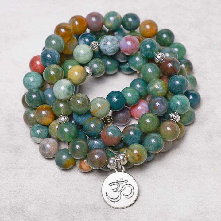 Bracelet Mala 108 Buddha Stones en agate indienne avec lotus OM Bouddha Arbre de vie et calme positif