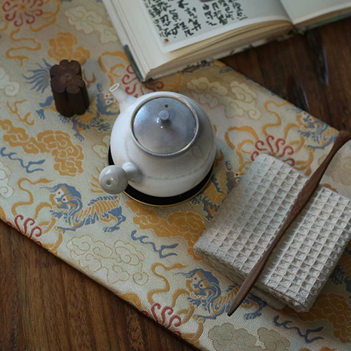 Dessous de verre élégant à motif de brocart floral pour tasse à thé