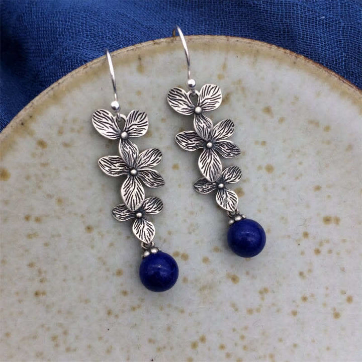 Boucles d'oreilles pendantes en argent sterling 925 avec Buddha Stones , turquoise, lazurite et lapis-lazuli, motif fleur et feuille, symbole de sérénité et de protection. - Lazurite et argent sterling 925 - image 10