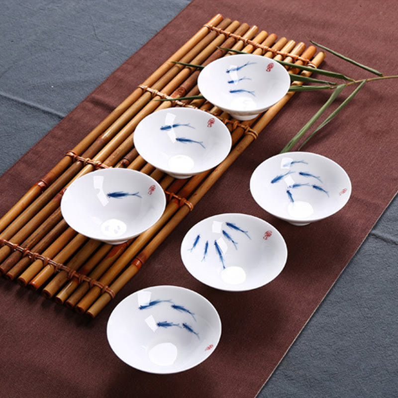 Tasse à thé en céramique de poisson koï en porcelaine bleue et blanche de Jingdezhen Buddha Stones