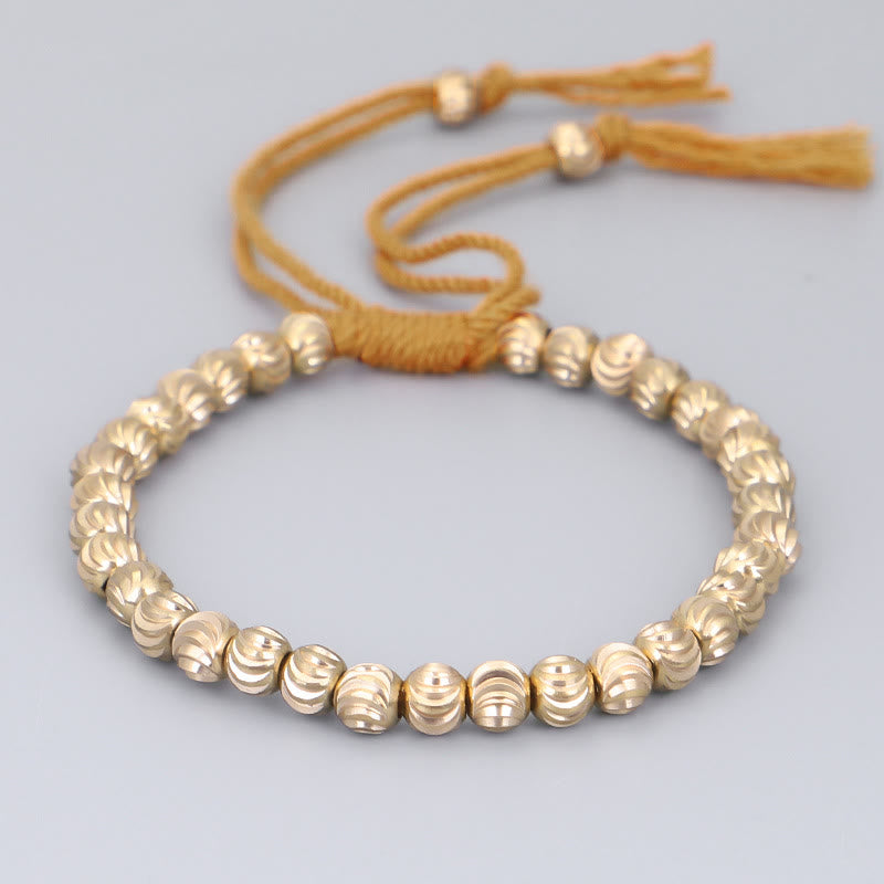Bracelet porte-bonheur en perles de cuivre tibétaines faites à la main avec Buddha Stones