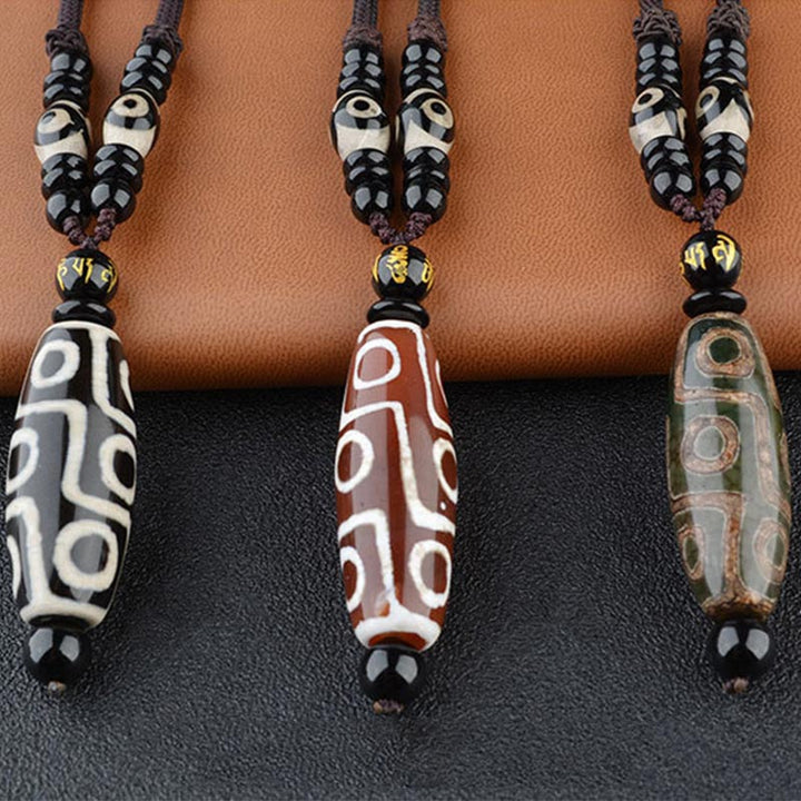 Collier de protection de richesse en perles Dzi à neuf yeux de Buddha Stones