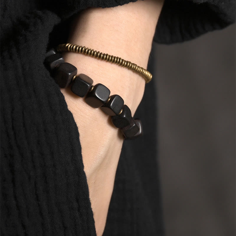 Bracelet double tour en cuivre et bois d'ébène tibétain avec Buddha Stones