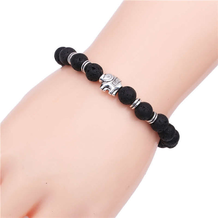 Bracelet diffuseur de paix et de guérison en pierre de lave œil de tigre avec éléphant