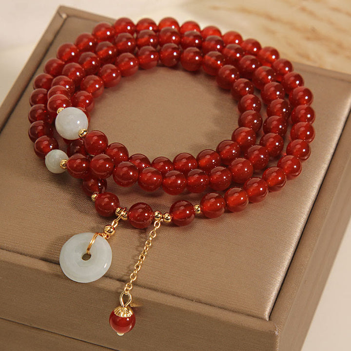 Bracelet triple tour en agate rouge naturelle et jade avec boucle de paix et calme en Buddha Stones