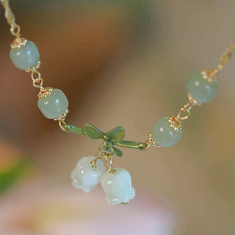 Bracelet chaîne de prospérité en perles de jade vert et muguet de Buddha Stones