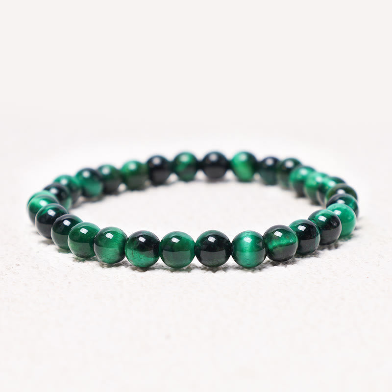 Bracelet énergétique de guérison et de croissance en œil de tigre Buddha Stones