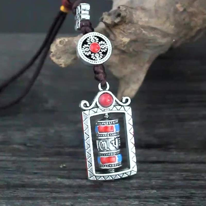 Porte-clés décoratif avec nœud rotatif et bénédiction en forme de roue de prière en six mots vrais en Buddha Stones