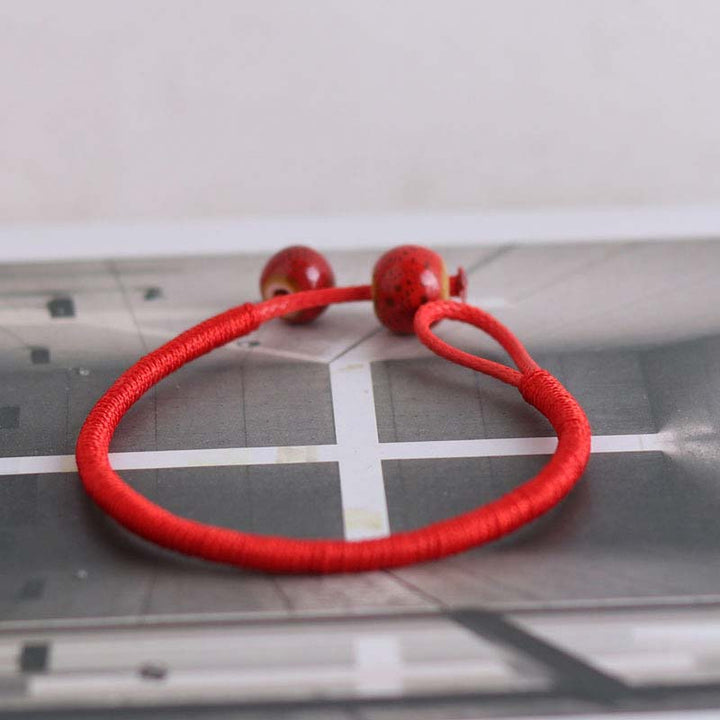 Bracelet en céramique rouge porte-bonheur Feng Shui Buddha Stones et fil rouge - image 7