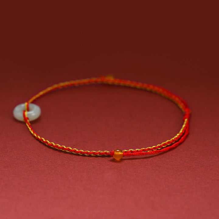 Bracelet de cheville tressé en jade avec boucle ronde de paix et de chance en Buddha Stones