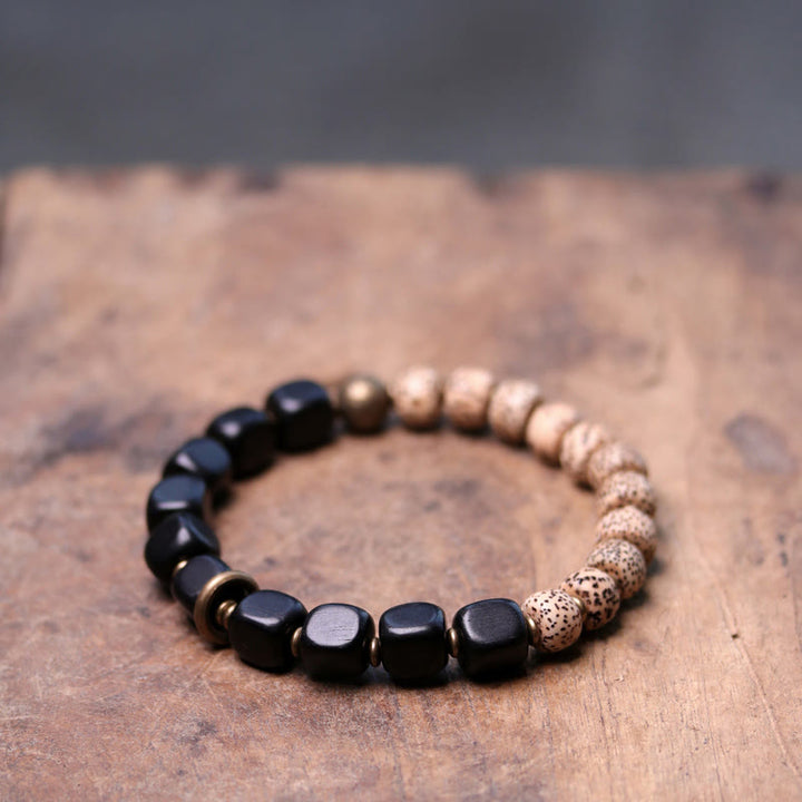 Bracelet de paix en cuivre et bois d'ébène avec Buddha Stones et graines de Bodhi tibétaines