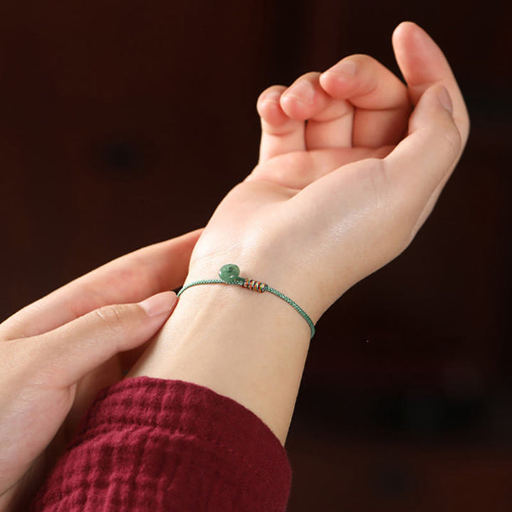 Bracelet en corde tressée tibétain fait main en aventurine verte avec Buddha Stones et protection de la chance