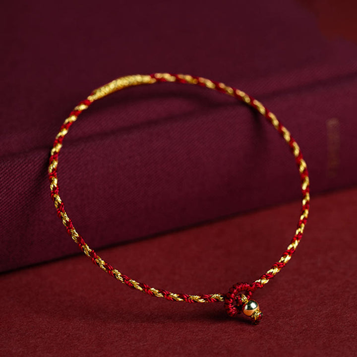 Bracelet porte-bonheur tressé en corde rouge fait main en plaqué or 14 carats avec nœud King Kong de Buddha Stones