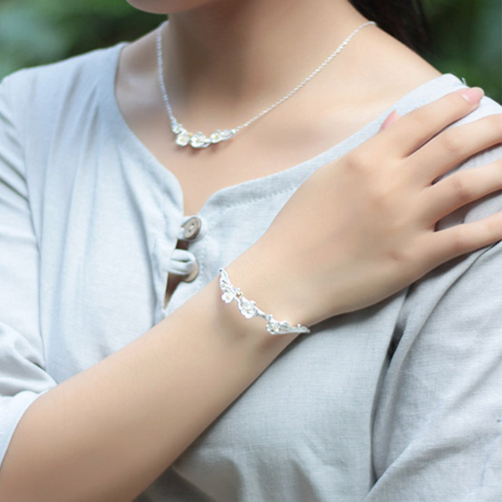 Bracelet réglable en argent sterling 925 Buddha Stones et fleur de prunier