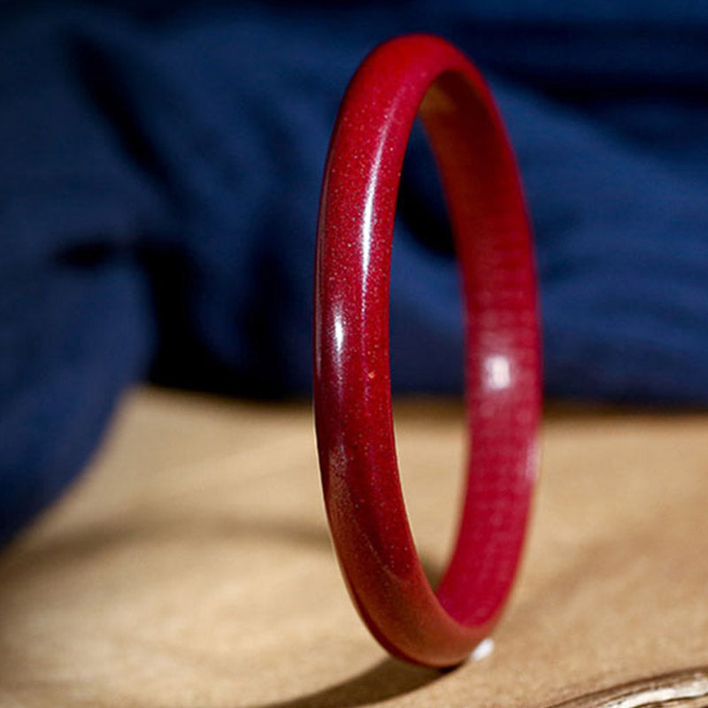 Bracelet jonc de bénédiction gravé du Sutra du cœur en Buddha Stones en cinabre