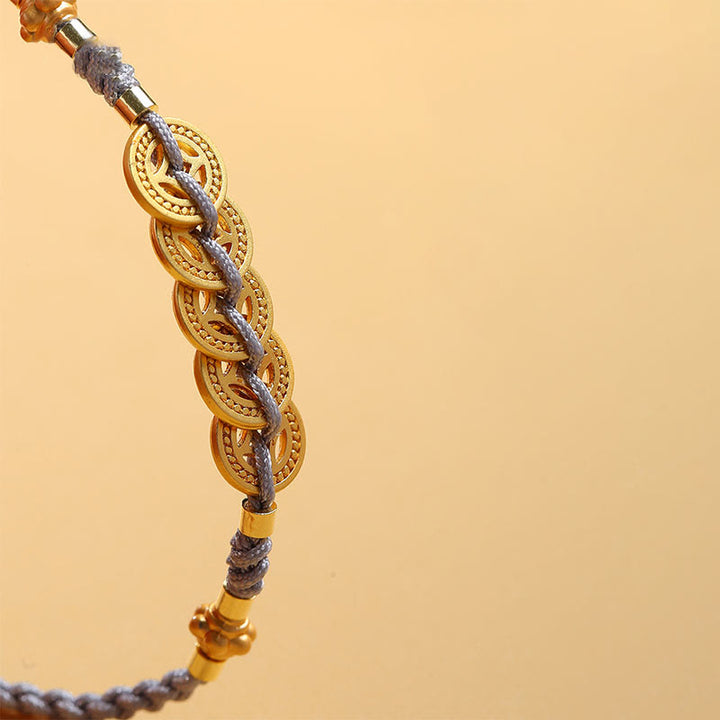 Bracelet tressé en corde bleue avec perles et arbre de fortune en cuivre et Buddha Stones
