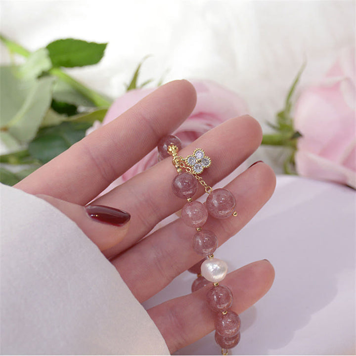 Bracelet d'amour en perles de quartz fraise naturelles et trèfle à quatre feuilles Buddha Stones