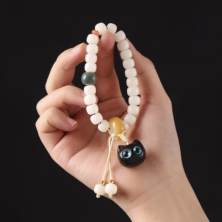 Bracelet en Buddha Stones en graines de Bodhi naturelles en bois noir africain avec joli chat et breloque pour la paix et l'harmonie - image 8