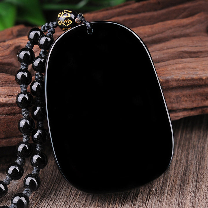 Collier avec pendentif en obsidienne noire représentant un dragon accompli et des Buddha Stones - image 5