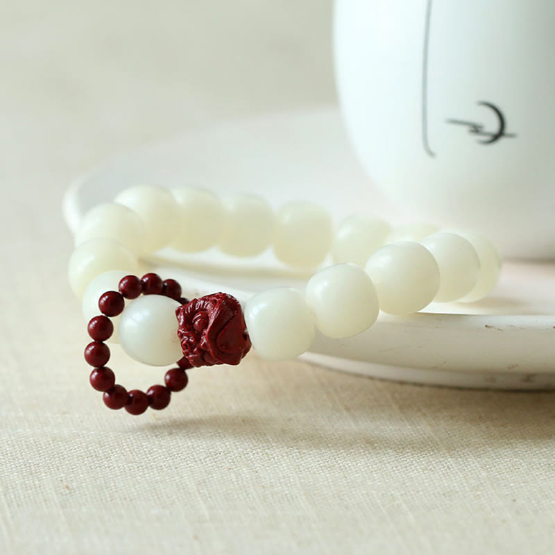 Buddha Stones de Bodhi Naturelles Cinabre Lion Dansant Charme Sagesse Harmonie Poignet Mala