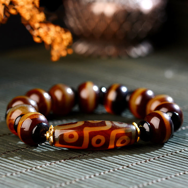 Bracelet tibétain en agate naturelle à neuf yeux avec perles dzi et Buddha Stones