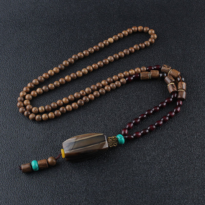 Collier pendentif en Buddha Stones tibétain en bois de wengé Bodhi Seed Agate Balance Peace